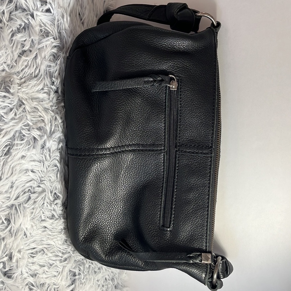 The sak black leather purse.